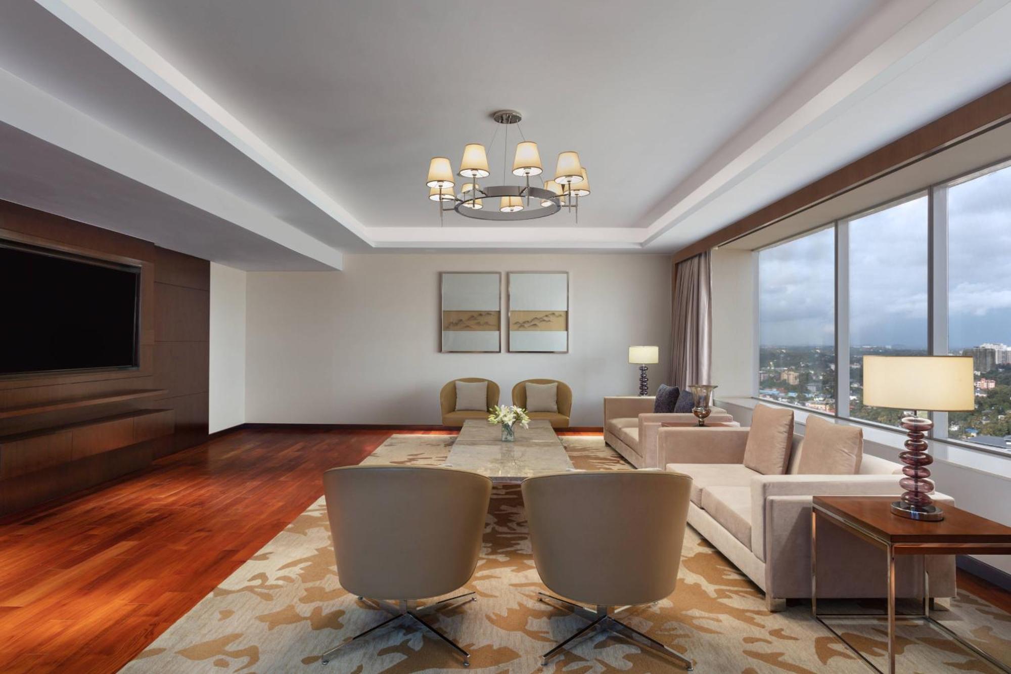 Kochi Marriott Hotel Екстер'єр фото A 3D rendering of a living room
